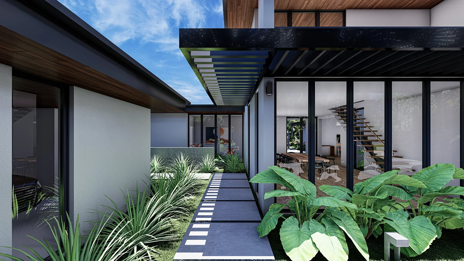Garden walk beneath the trellis beside the glazed stair hall